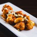 Buffalo Brussels $7.00 Fried Brussels sprouts, buffalo sauce, blue cheese crumbles