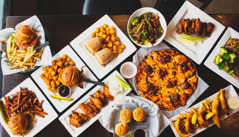 Food laid out on a table at a bar in Lake Elmo, MN waiting for customers to eat